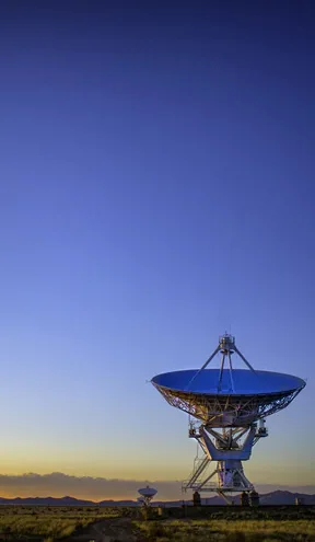Satellite dish at dusk